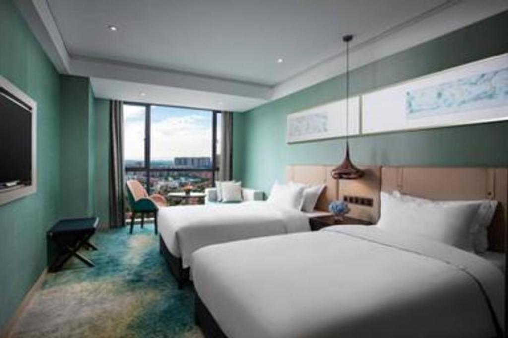 Ramada Plaza By Wyndham Changsha Xingsha Esterno foto